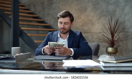 Portrait Of Smiling Business Man Counting Money At Workplace In Slow Motion. Man Made Easy Money. Successful Businessman Rejoicing Good Deal. Joyful Manager Throwing Wad Of Money Away In Office.