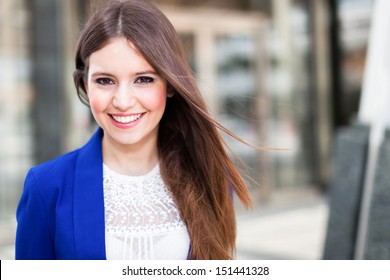 Portrait of a smiling business woman - Powered by Shutterstock