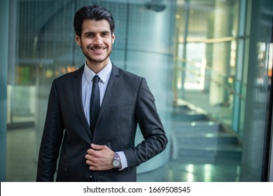 Portrait Of A Smiling Businessman In A Modern Business Environment