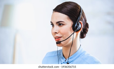 Portrait Of Smiling Call Center Operator In Headset