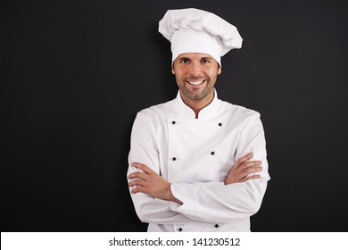 Portrait Of Smiling Chef In Uniform 