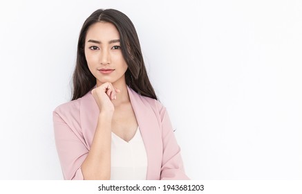 Portrait Of Smiling Confident Asian Business Woman In Pink Suit Office. Asian Business Girl. Startup Successful Power Business Leader Women Executive People Looking Camera Copyspace Isolated On White