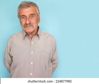 Portrait of a smiling and confident elderly good looking business man