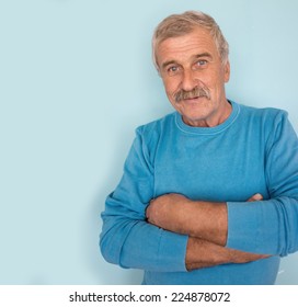 Portrait Of A Smiling And Confident Elderly Good Looking Business Man