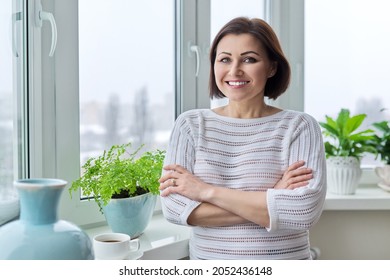 Portrait Of A Smiling Confident Woman 45 Years Old