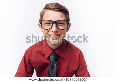 Portrait of smiling cute teen on white background, in red shirt, advertisement,