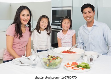 Portrait Smiling Family Sitting Dining Table Stock Photo 163780970 ...