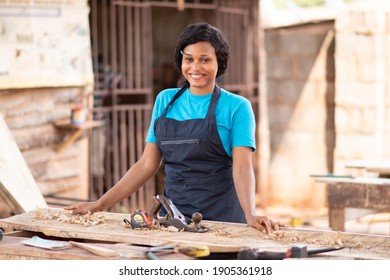 Portrait Of A Smiling Female African Carpenter