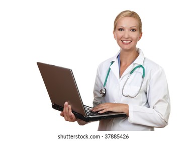 Portrait Of Smiling Female Doctor Holding A Computer Isolated On White