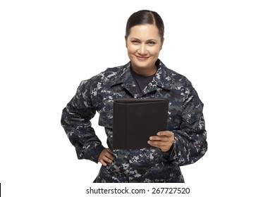 Portrait Of Smiling Female Navy Sailor With Digital Tablet Against White Background