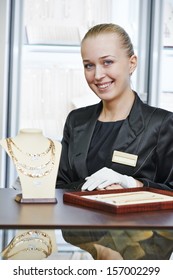 Portrait Of Smiling Female Sales Assistant In Jewelry Shop