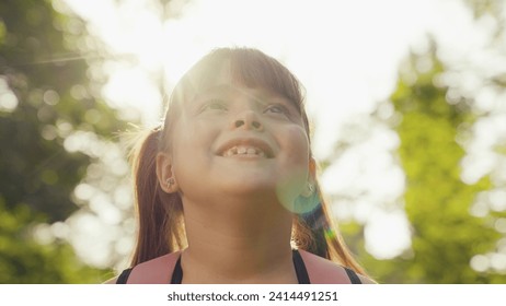 portrait smiling girl, looking sky, smile face child kid girl, child face rays sunlight, child close-up children playground, bokeh background sunset flare, family girl daughter happy dream, face sky - Powered by Shutterstock