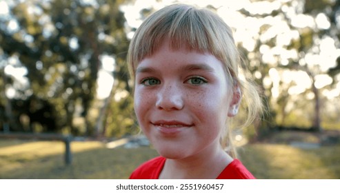 Portrait of smiling girl standing in boot camp during obstacle course - Powered by Shutterstock