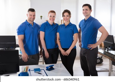 Portrait Of A Smiling Janitors In Uniform At Office - Shutterstock ID 686340961