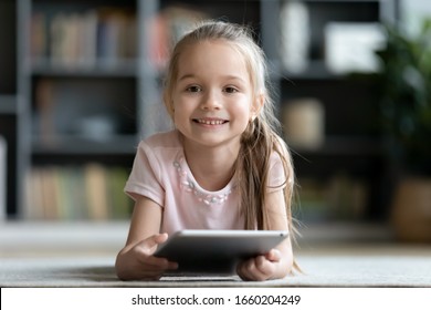 Portrait Smiling Little Girl Lying On Stock Photo 1660204249 | Shutterstock