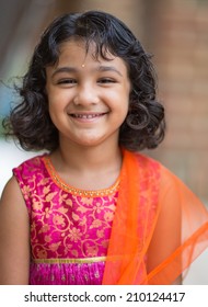 Portrait of a Smiling Little Indian Girl in Ethnic Costume