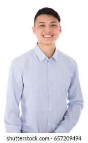 Portrait Of A Smiling Male College Student In Front Of White Background