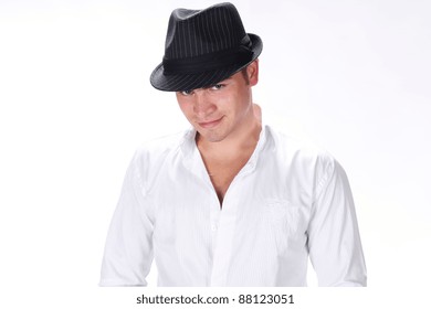 Portrait smiling man in hat posing on white background