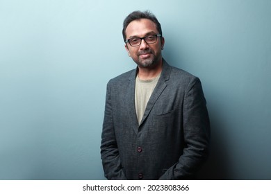 Portrait Of A Smiling Man Of Indian Origin