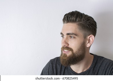 Portrait Of A Smiling Man And Looking To The Left.