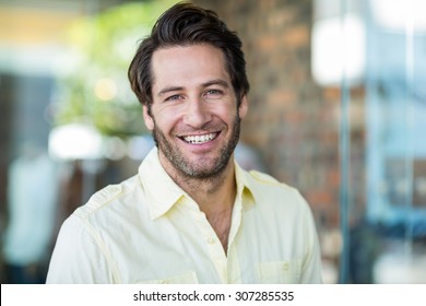 Portrait Of Smiling Man At Shopping Mall