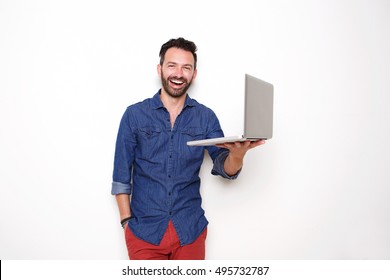 Portrait Of Smiling Mature Guy Holding Laptop Over White Background