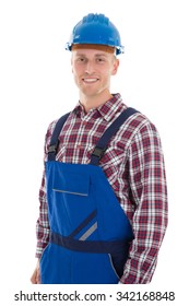 Portrait of smiling mid adult construction worker standing against white background