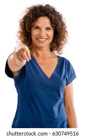 Portrait Of A Smiling Middle Aged Woman Pointing To The Camera