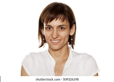 Portrait Of Smiling Middle-aged Woman With No Makeup