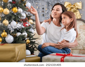 Portrait of smiling mom with little daughter - Powered by Shutterstock