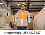 Portrait of smiling multiracial logistic coordinator carrying box with order and preparing it for shipment at dropshipping warehouse.