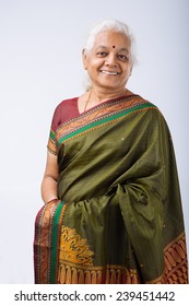 Portrait Of Smiling Senior Indian Woman In Traditional Costume