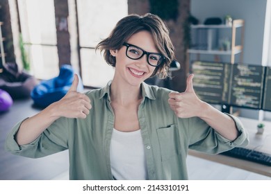 Portrait of smiling server optimization expert two hands show thumb up approve office room indoors