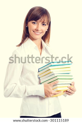 Portrait of smiling student or young businesswoman with textbooks