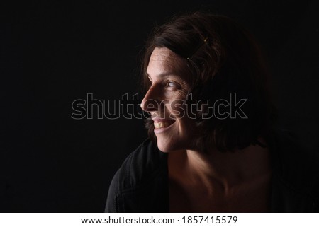 Similar – a woman lies on a green sofa. resting.