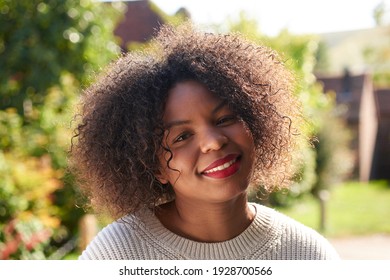 Portrait of a smiling woman outdoors