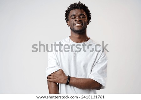 Similar – Image, Stock Photo Portrait of Black young woman laughing with genuine emotion while enjoying party with friends at home