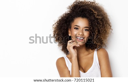 Portrait of smiling young black woman with copy space
