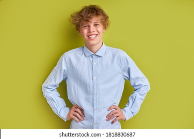 Portrait Of Smiling Young Boy 14 Years Old Isolated Over Green Background, Look At Camera. Youth Concept