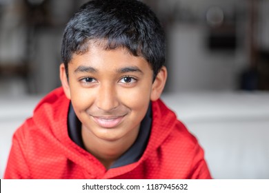 Portrait of a Smiling Young Boy with Shallow Depth of Field