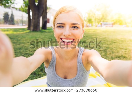 Similar – A Blonde pretty young boho style woman in a river in summer