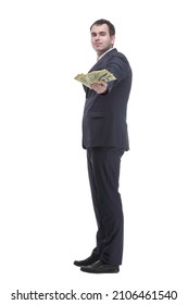 Portrait Of Smiling Young Man Holding Fanned US Paper Currency