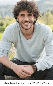 Portrait Of Smiling Young Man Outside