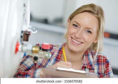 Portrait Of Smily Female Plumber