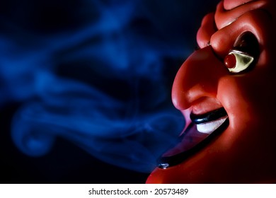 portrait of smoking devil - Powered by Shutterstock - Get 15% off with code: PIKWIZARD15