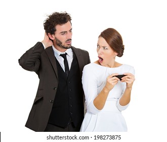 Portrait Sneaky Upset Jealous Possessive Boyfriend Angry Watching Girlfriend Texting Someone Else, Mad When Confronted Isolated White Background. Negative Emotion Facial Expression Feeling Conflict