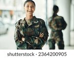 Portrait, soldier and woman with arms crossed, military and security with a smile, confident and power. Face, person and warrior with pride, camouflage and protection with training, happy and war