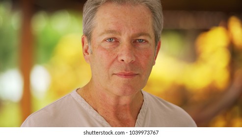 Portrait of a somber mid aged white man - Powered by Shutterstock