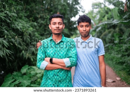 Portrait of south asian young boys, young handsome brothers are in outdoor 