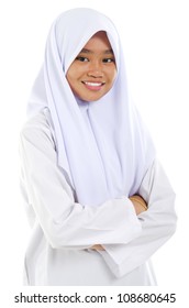 Portrait Of A Southeast Asian Muslim Teen Crossed Arms Over White Background